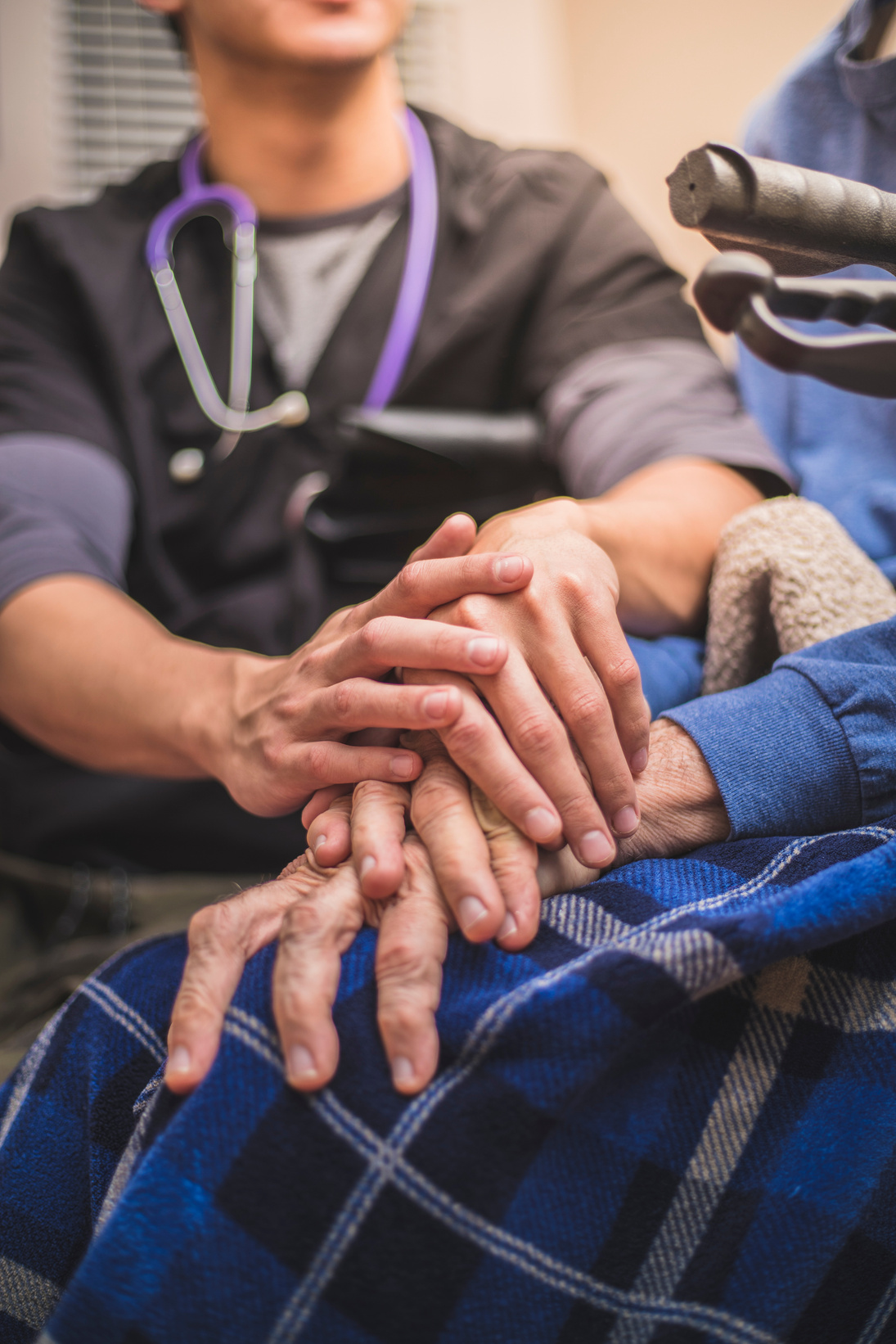 Hospice Nurse visiting an elderly male patient